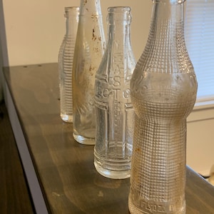 Set of 4 1920’s Glass Bottles