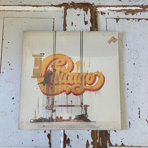 Vintage 1975 Vinyl Album IX: Chicago's Greatest Hits is the First
