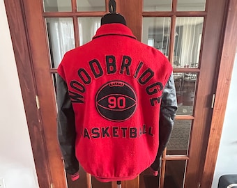 May include: Red and black varsity jacket with "Woodbridge Basketball 90" embroidered on the back.