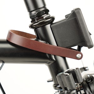 Cinghia di bloccaggio del portapacchi anteriore per Brompton Cinghia in pelle per portapacchi anteriore per bicicletta Brompton