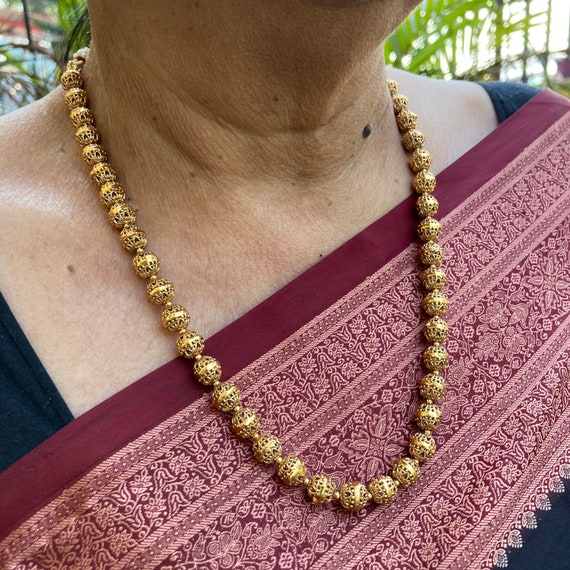 Antique gold beads online necklace
