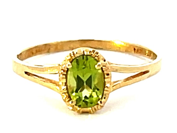 Oval Peridot Ring in 14k Yellow Gold