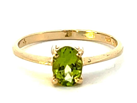 Oval Peridot Ring in 14k Yellow Gold - image 1