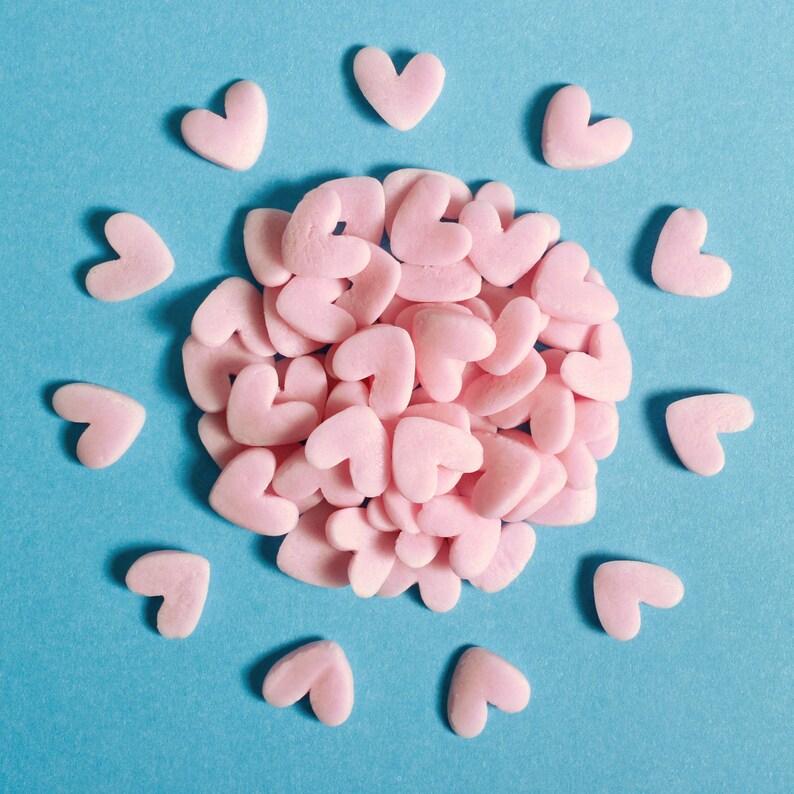 Pink jumbo heart shaped edible cake sprinkles.