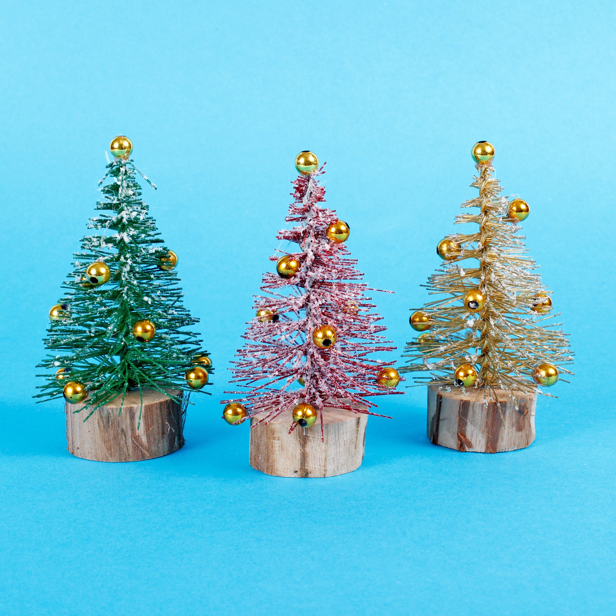 Cone Christmas Trees from Vintage Wrapping Paper (to go with your glittery  dinosaurs) 