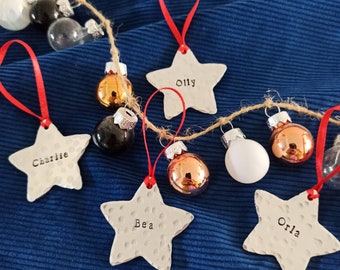 Set of 3 Personalised Christmas tree star decorations. Names on each star.