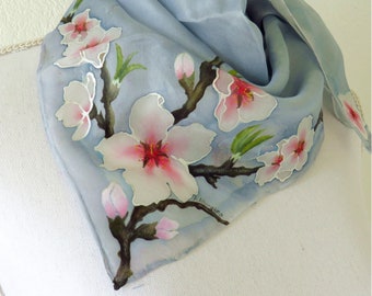 Floral silk handkerchief scarf with blooming almond branches. Sakura flower.