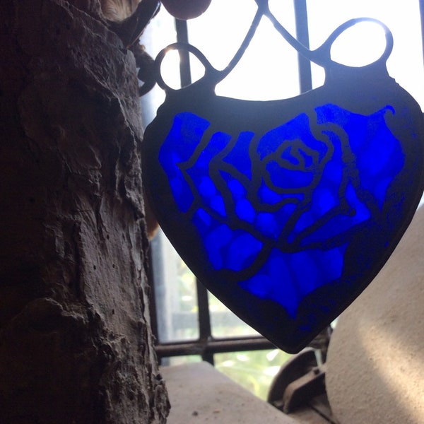 Blauwe roos hart zonvanger