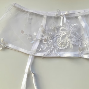 White sheer garter belt set for bride on wedding day