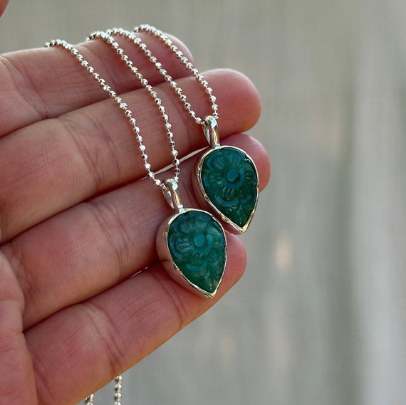 Carved Emerald Pendant