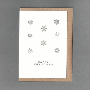 Happy Christmas. Ice crystals. Snow flakes. Vintage Christmas. Letterpress Card. Historical print. Archives. Unlock History. image 1
