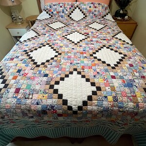 1950’s Feedsack Aunt Jen’s Postage Stamp Quilt