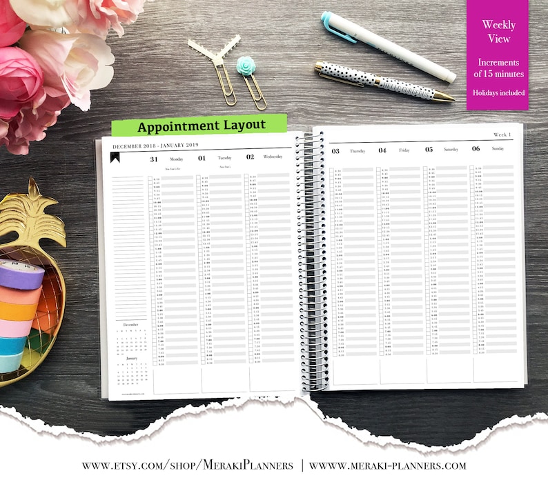 May include: Open weekly planner with appointment layout, December 2018 - January 2019. The planner has increments of 15 minutes and includes holidays. The planner is open to a week view with a spiral binding. The background includes pens and decorative items.