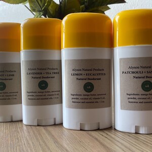 May include: Four white deodorant sticks with bright yellow caps, each featuring a tan label with the brand name Alyson Natural Products, scent names like Bergamot + Lime, Lavender + Tea Tree, Lemon + Eucalyptus, and Patchouli + Sandalwood, and 2 oz.