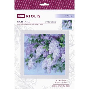 May include: A Riolis cross-stitch kit, number 1533, titled Lilacs after the Rain. The packaging displays a finished square embroidery of purple lilac flowers with green leaves on a light blue background, measuring 17 3/4 by 17 3/4 inches.