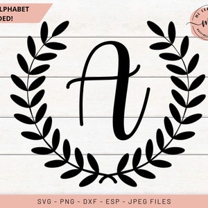 May include: A black letter "A" inside a black laurel wreath on a white background with horizontal wood grain. The text "FULL ALPHABET INCLUDED!" is in the upper left corner. The bottom of the image includes file type information.