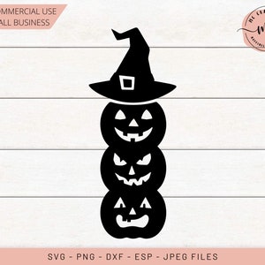 May include: A black and white digital design of a stack of four jack-o'-lantern pumpkins with a witch's hat on top. The pumpkins have different facial expressions.