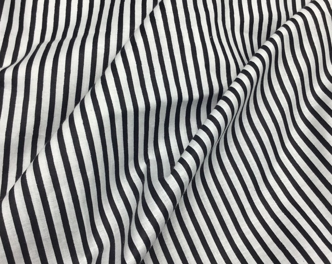 Indian block printed cotton muslin, hand made. Black stripes on off white.