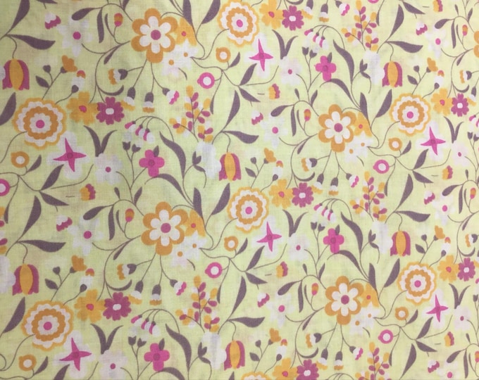 English Pima lawn cotton fabric, seventies flowers on light green