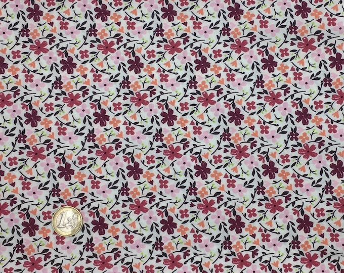 High quality cotton poplin dyed in Japan with maroon floral print