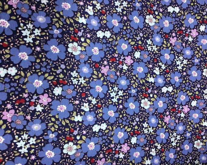 Cotton poplin with Betty blue floral on navy