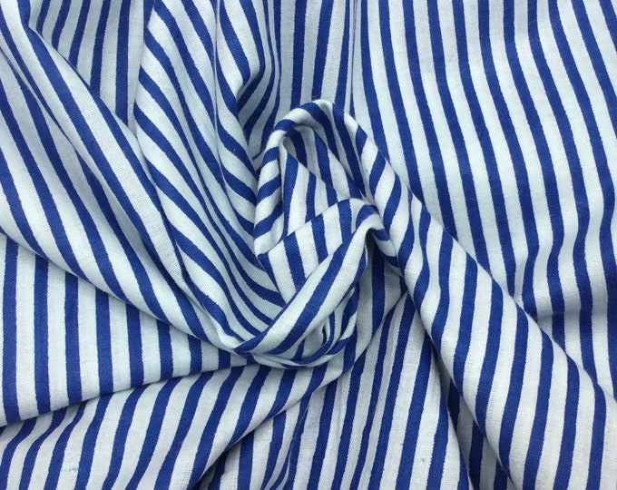 Indian block printed cotton muslin, hand made. Blue stripes on off white.