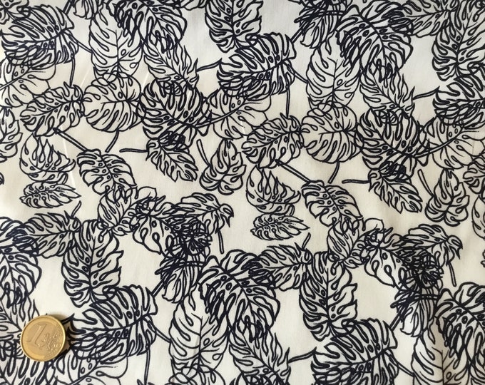 Cotton poplin with navy foliage print on off white