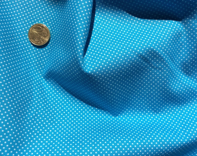 High quality cotton poplin dyed in Japan with 2mm polka dots mid turquoise