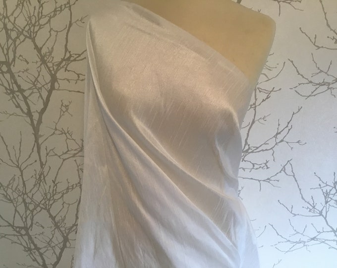 Faux taffetas dupioni silk fabric. Color off white or off-white