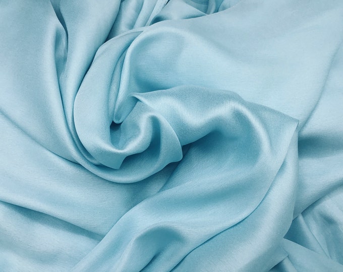 Faux silk satin fabric. Light turquoise or ice blue