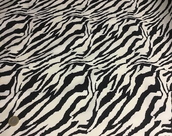 Oekotex cotton poplin with black/ivory zebra print