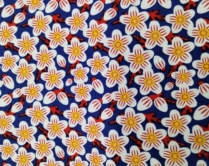 Cotton poplin with Fifties floral on blue