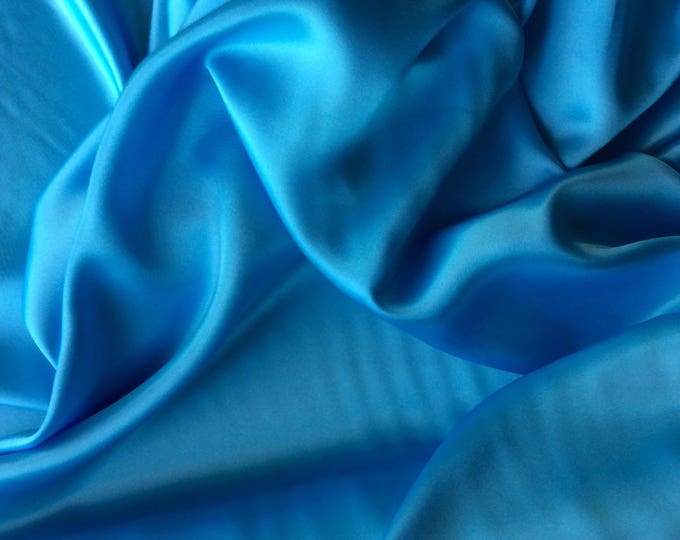 High quality silky sateen, backed crepe. Blue/turquoise nr36