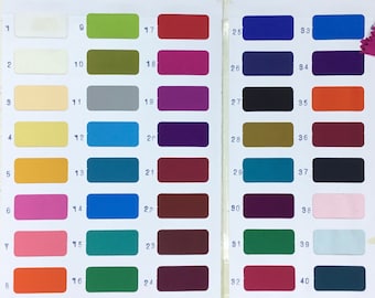 May include: A colour swatch chart displaying 40 fabric colour samples. The samples are arranged in a grid, showcasing a wide range of hues, including shades of blue, green, pink, red, and purple. Each colour is numbered for easy reference.