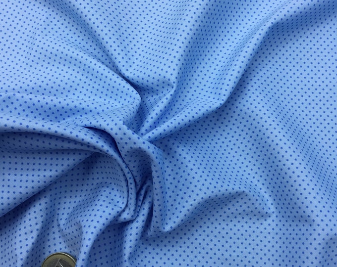 High quality cotton poplin. Blue polka dots on baby blue, nr45