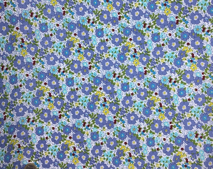Cotton poplin with Provence blue flowers on off white