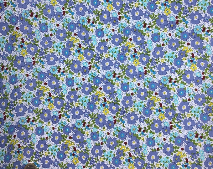 Cotton poplin with Provence blue flowers on off white