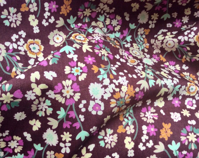 Cotton poplin with floral on brown