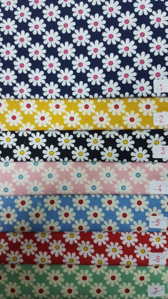 Tessuto Popeline di cotone a fantasia motivo floreale blu navy - panna