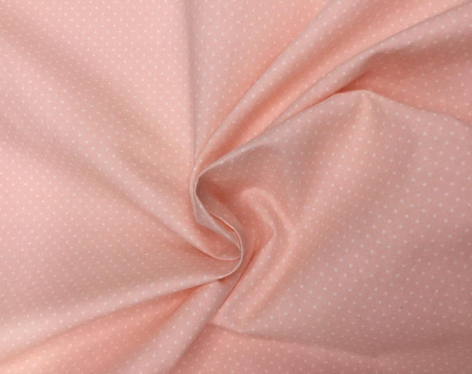 High quality cotton poplin, 1mm polka dots on soft peach