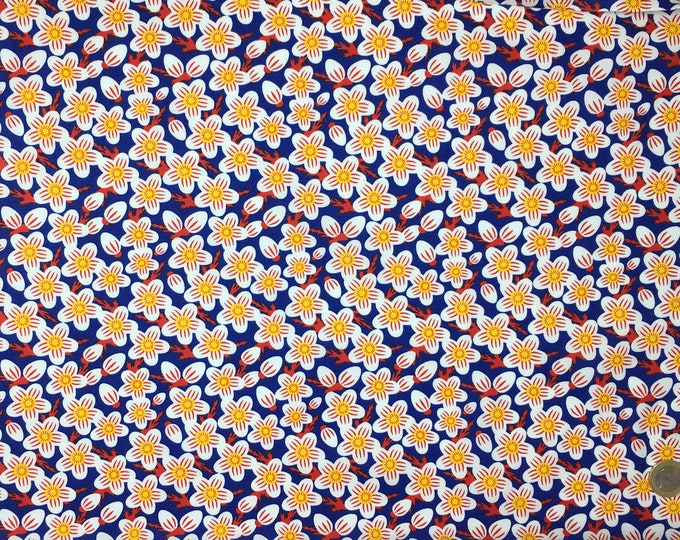 Cotton poplin with Fifties floral on blue