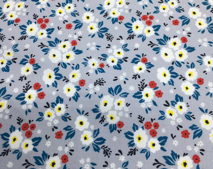 Cotton poplin with Fifties floral on silver Grey