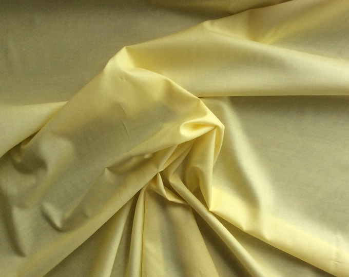 Plain cotton lawn fabric, lemon yellow