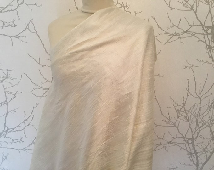Dupioni silk, or raw silk. Off white or light ivory