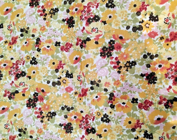 High quality cotton poplin dyed in Japan with sun yellow Floral print on off white