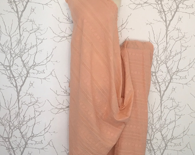 Peach embroidery anglaise, eyelet or broderie anglais cotton fabric, scalloped edges