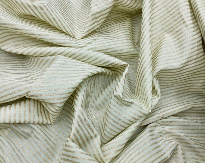 Indian block printed cotton voile, hand made. Golden Jaipur on off white