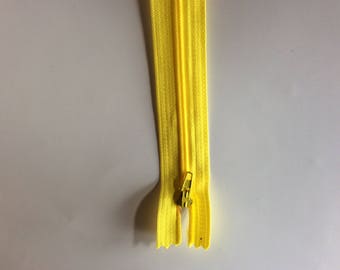 Fermeture eclair jaune non séparable 30cm pour jupes, pantalons etc