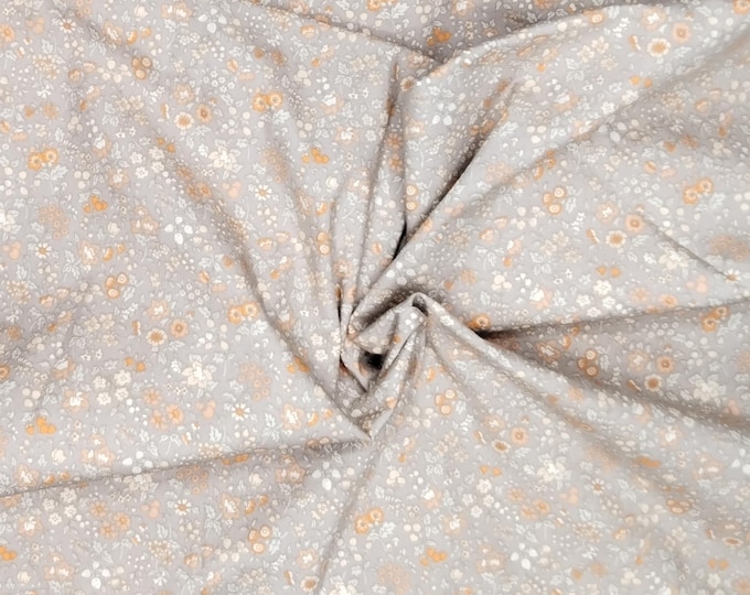 High quality cotton poplin dyed in Japan with silver grey floral print