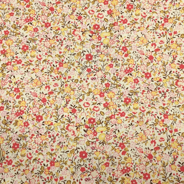 High quality cotton poplin with yellow floral on cream or ivory